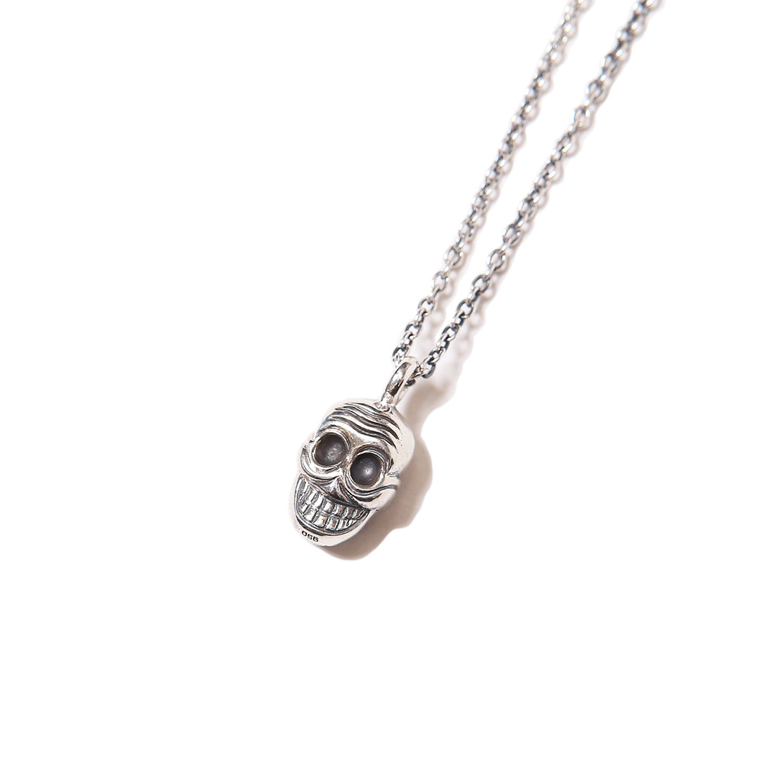 REVERSIBLE TIBETAN SKULL PENDANT