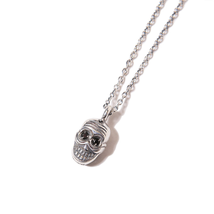 REVERSIBLE TIBETAN SKULL PENDANT